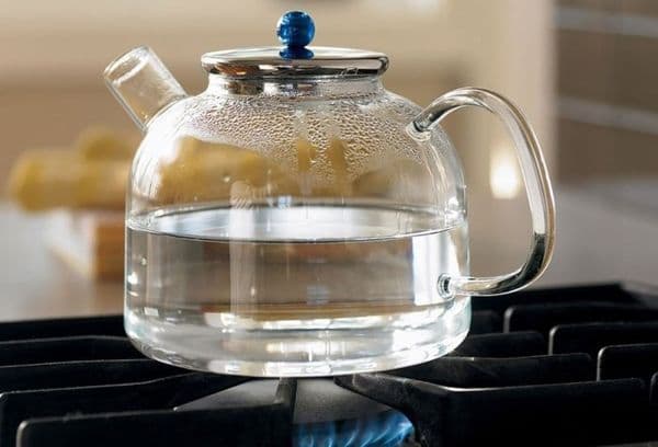 Water in a glass teapot